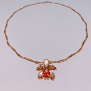 14k Rose Gold Orchide Pendant From Na Hoku.